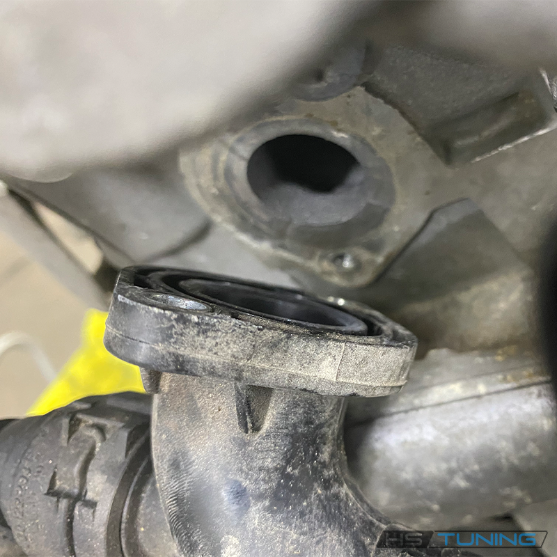 Coolant-pipe joint service context for 06E-121-119-K seal; pipe not included, source photo 2
