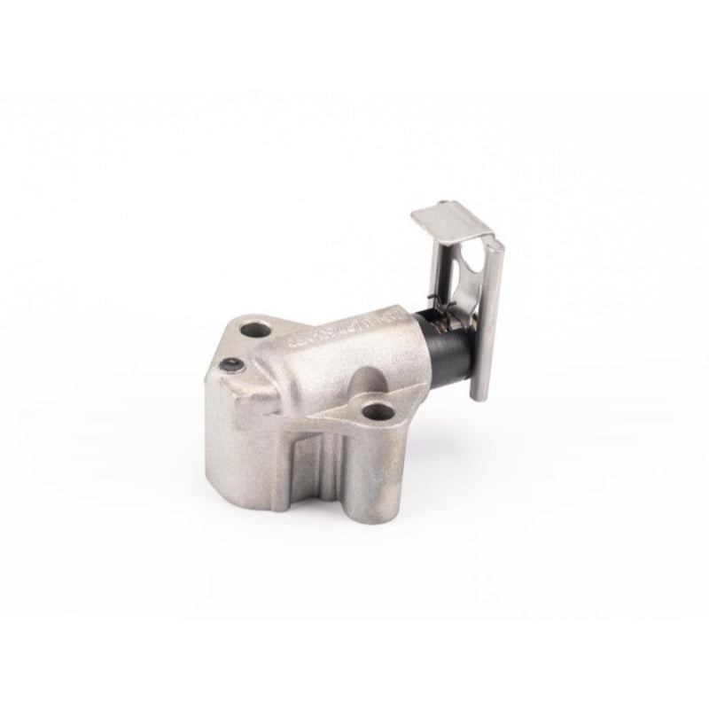 Genuine VW/Audi 06K-109-467-K timing chain tensioner showing housing, mounting holes and retaining mechanism; repeated source photo 5