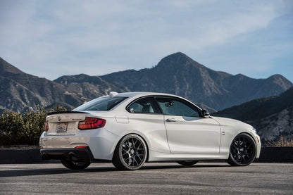 Dinan Free Flow Axle-Back Exhaust - 2014-2016 BMW M235i Stainless Steel - Black Tips - w/o M-Performance Rear Valance - F22