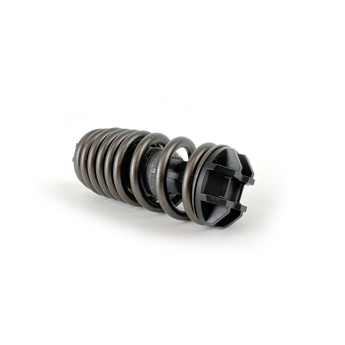Genuine VW/Audi 1K0-721-403 clutch pedal over-center spring showing coil and molded end supports; second source photo
