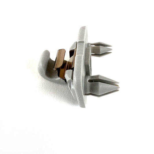 Genuine VW/Audi 8W0-857-562-A-1YE silver sun visor retaining clip showing molded holder, metal retaining element and mounting features