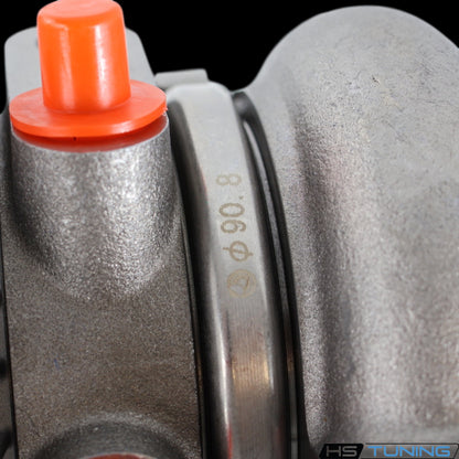 BMTS 40009785 turbocharger housing detail with 90.8 marking and protective cap