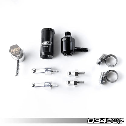 HS Tuning 034Motorsport catch can kit components including black billet aluminum catch can, check valves, and hardware.