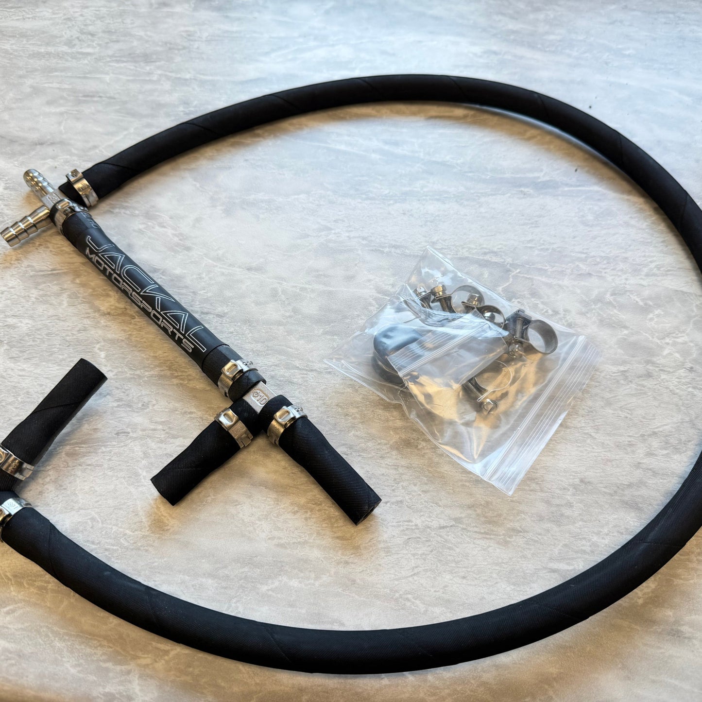 HS Tuning Jackal Motorsports Audi CREC MPI fueling upgrade kit with ethanol-safe black hoses and stainless clamps.