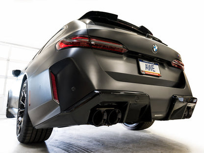 HS Tuning AWE Tuning Track Edition cat-back exhaust with diamond black tips installed on a matte black BMW M5 Touring