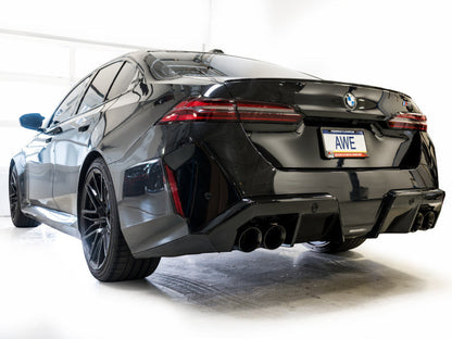 HS Tuning AWE Tuning Track Edition cat-back exhaust with diamond black tips installed on a black BMW M5 rear view