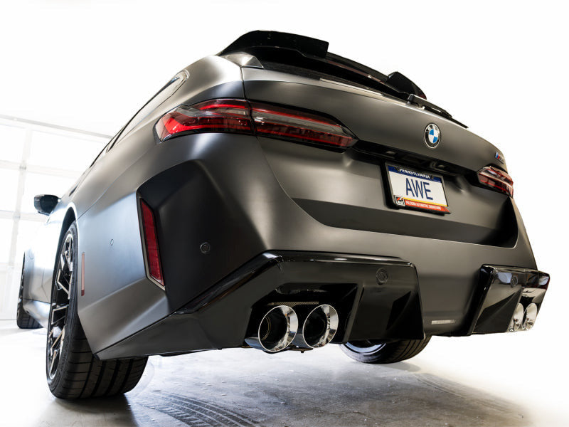 HS Tuning AWE Tuning Track Edition cat-back exhaust with chrome silver tips installed on a matte black BMW M5 Touring