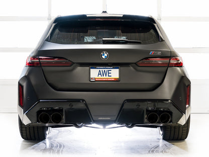 HS Tuning AWE Tuning Track Edition cat-back exhaust with diamond black tips installed on a matte black BMW M5 Touring