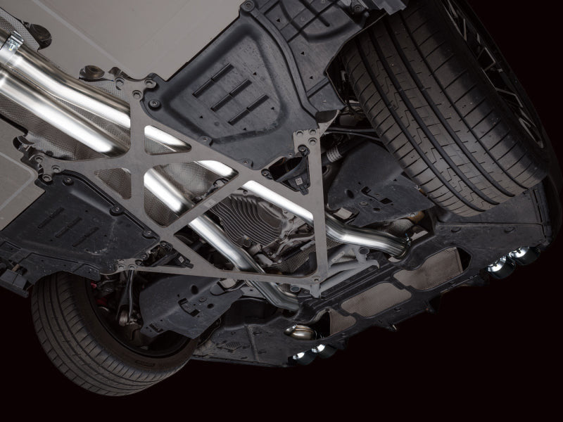 HS Tuning AWE Tuning Track Edition cat-back exhaust system with chrome silver tips installed under a BMW M5