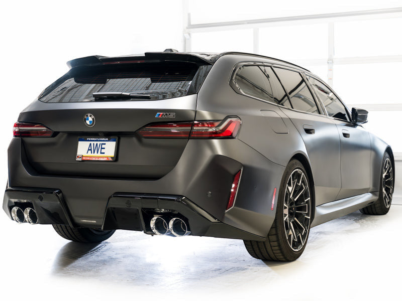 HS Tuning AWE Tuning Track Edition cat-back exhaust with chrome silver tips installed on a matte grey BMW M5 Touring