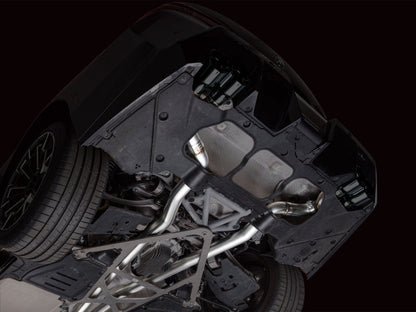 HS Tuning AWE Tuning Track Edition cat-back exhaust with diamond black tips installed on a BMW G90 M5 undercarriage