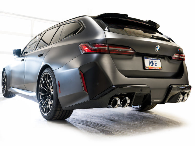 HS Tuning AWE Tuning Track Edition cat-back exhaust with chrome silver tips installed on a matte black BMW M5 Touring