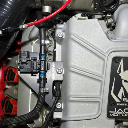 HS Tuning Jackal Motorsports ethanol sensor bracket installed on an Audi 3.0TFSI engine bay with fuel lines