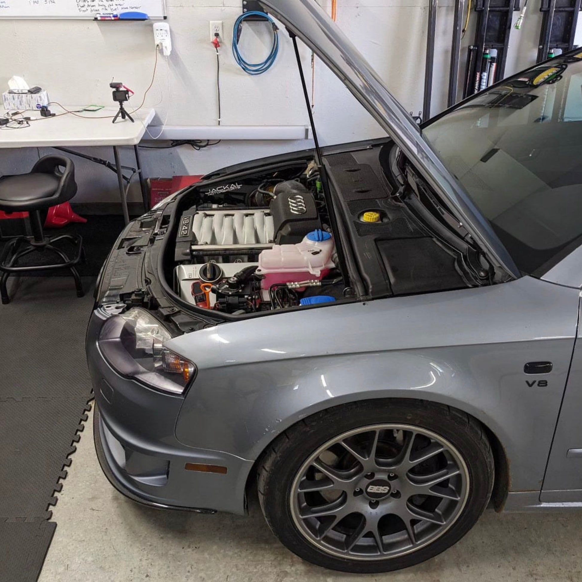 HS Tuning Jackal Motorsports air intake system installed in a silver Audi B6/B7 S4 engine bay