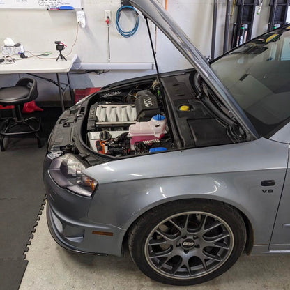HS Tuning Jackal Motorsports air intake system installed in a silver Audi B6/B7 S4 engine bay
