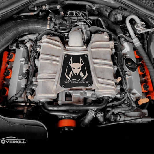 HS Tuning Jackal Motorsports black supercharger plate installed on a 3.0T CREC engine bay