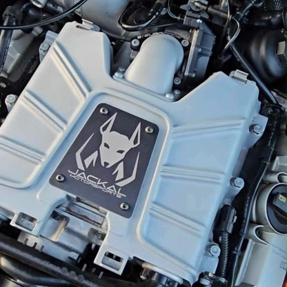 HS Tuning Jackal Motorsports black metal supercharger plate installed on a 3.0TFSI engine