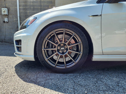 HS Tuning B2BFAB mild lift kit installed on a white Volkswagen Golf R with aftermarket wheels and performance tires.