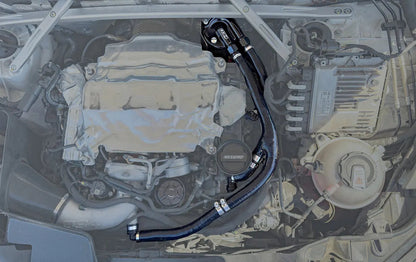 HS Tuning 034Motorsport catch can kit installed in an Audi engine bay with black billet aluminum and silicone hoses.
